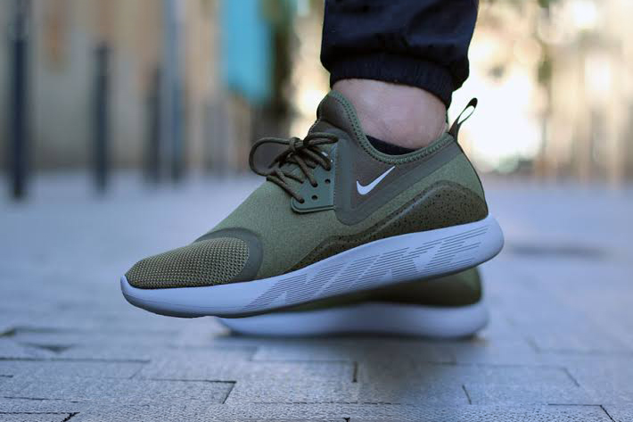 Olive green Nike sneakers with white soles